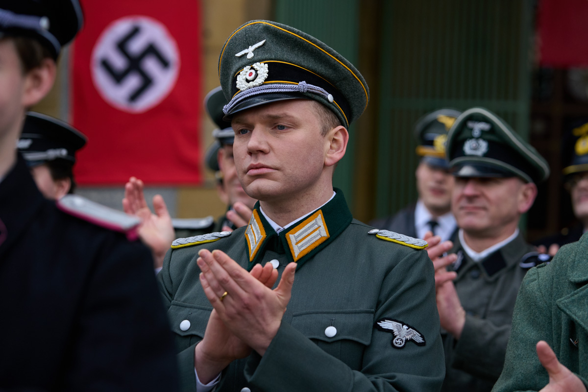 Soldier attends speech in world war ii